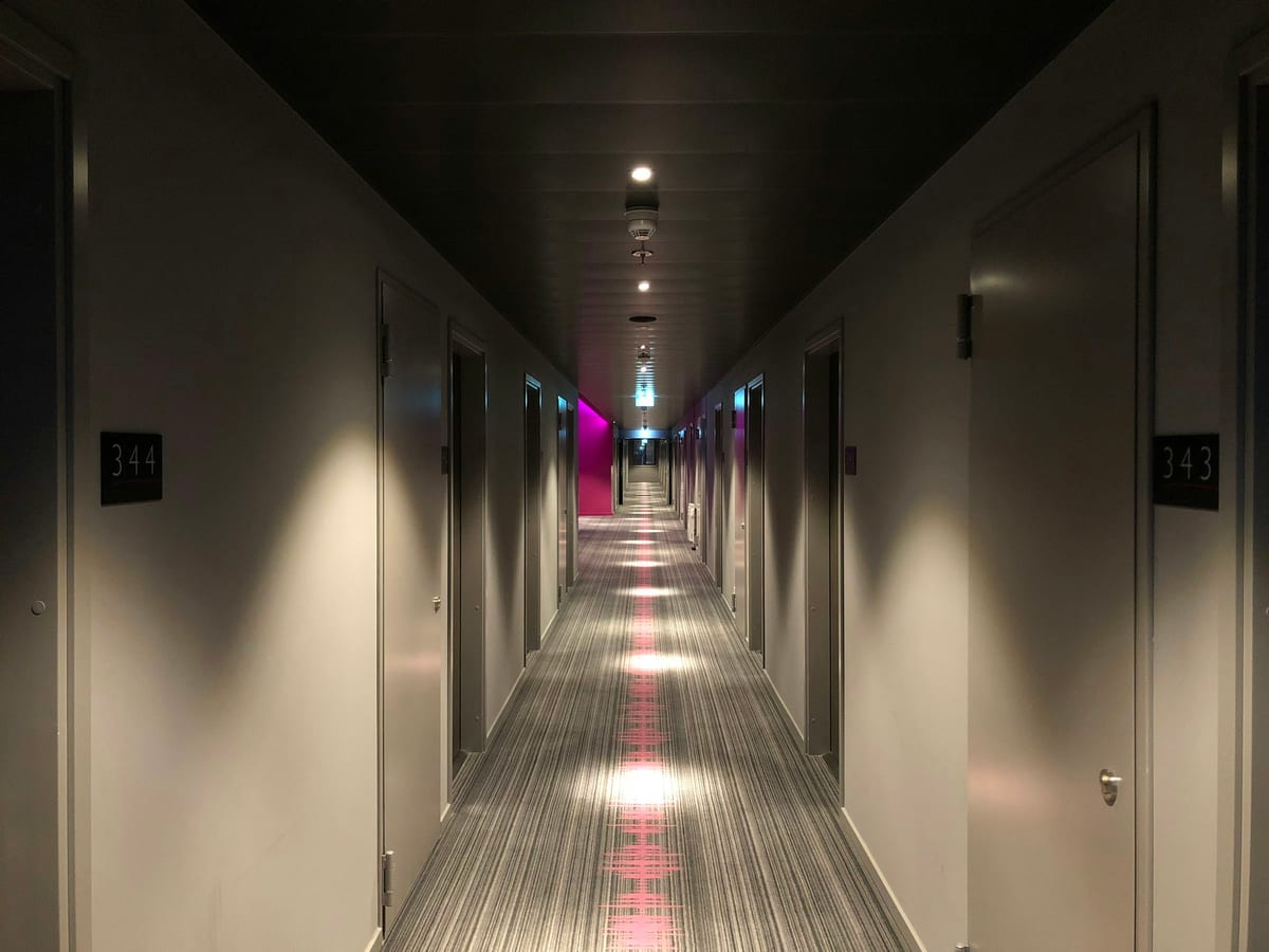 Hospitality interior with coordinated furniture and atmospheric lighting