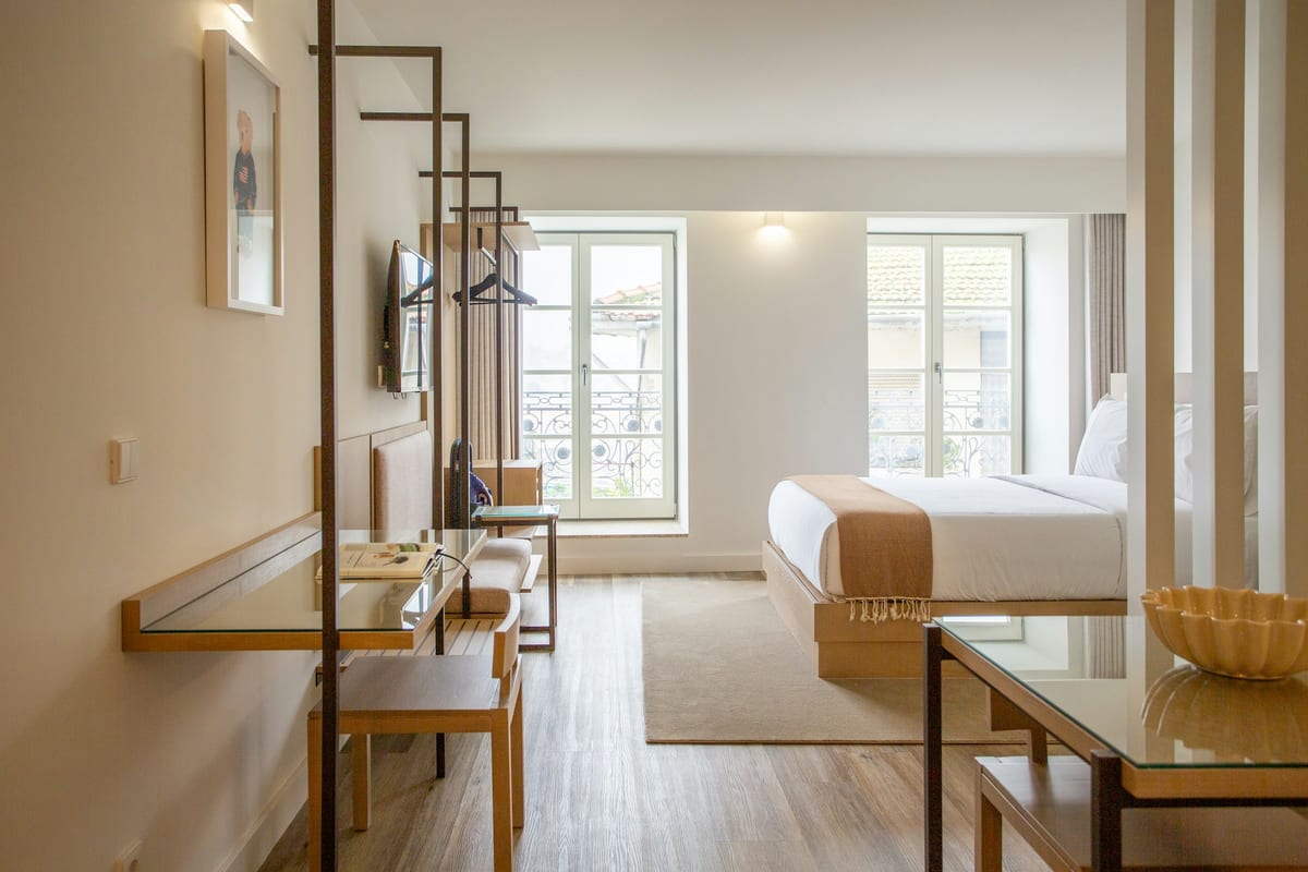Hotel room interior with furniture and layered lighting