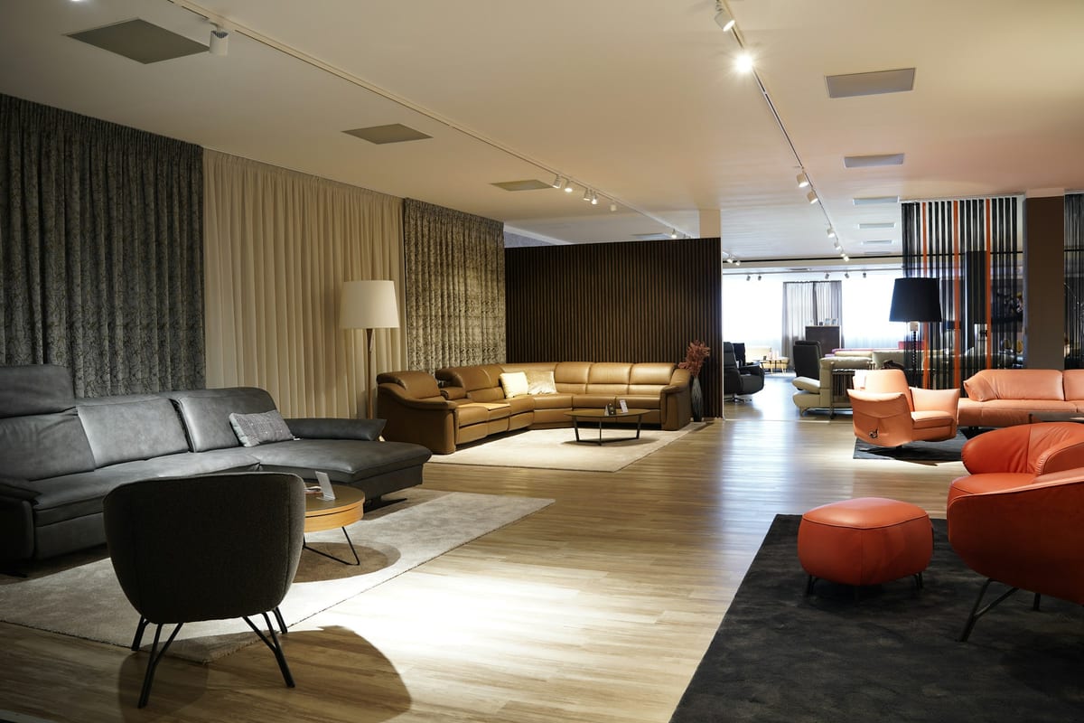Coordinated seating and tables in a refined interior setting